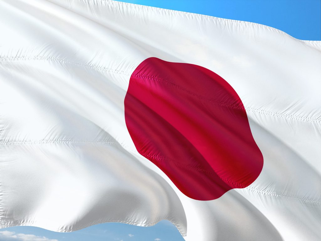 Japans flagga. En vit flagga med en röd cirkel i mitten.